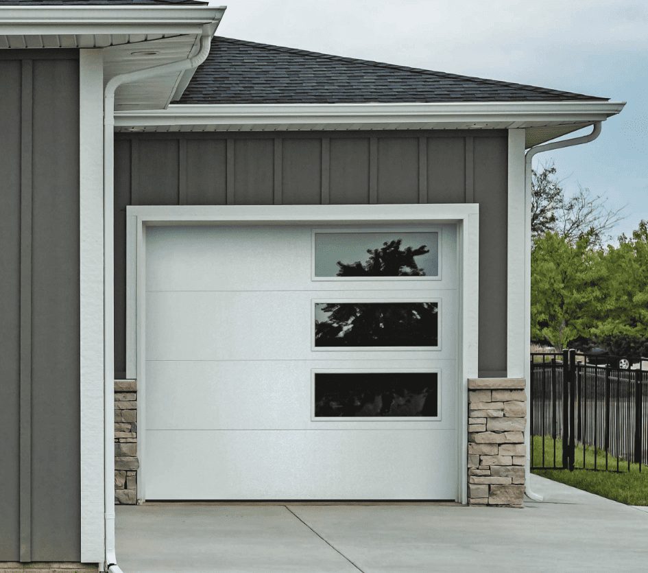 White garage door with oversized windows